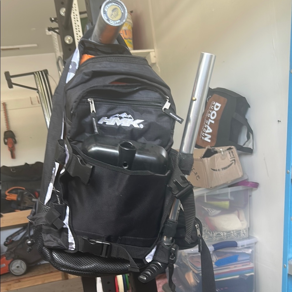 HMK snow mobiling backpack with shovel